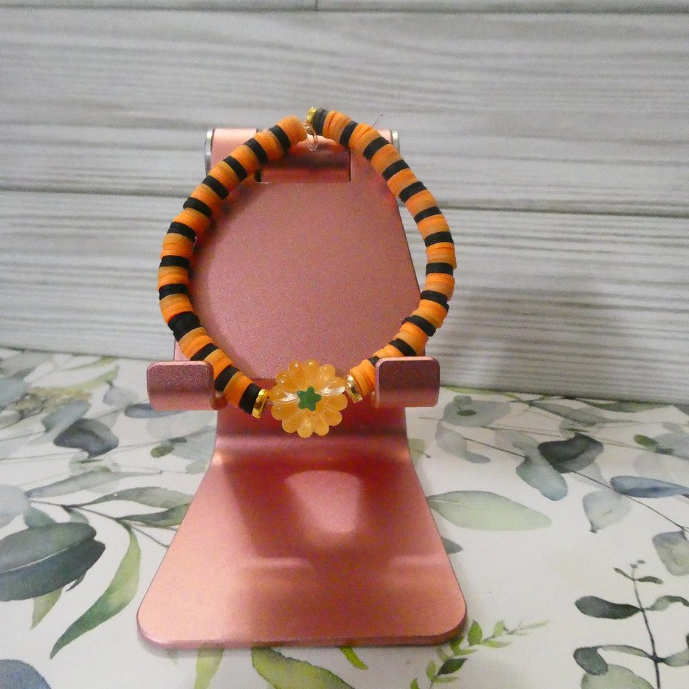 Handmade clay beaded Halloween pumpkin inspired bracelet.